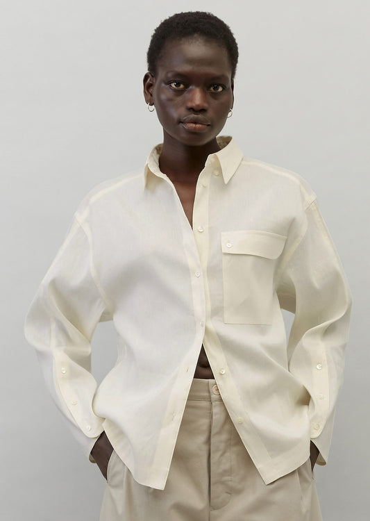 Блуза изработена од елегантен лен со органски памук